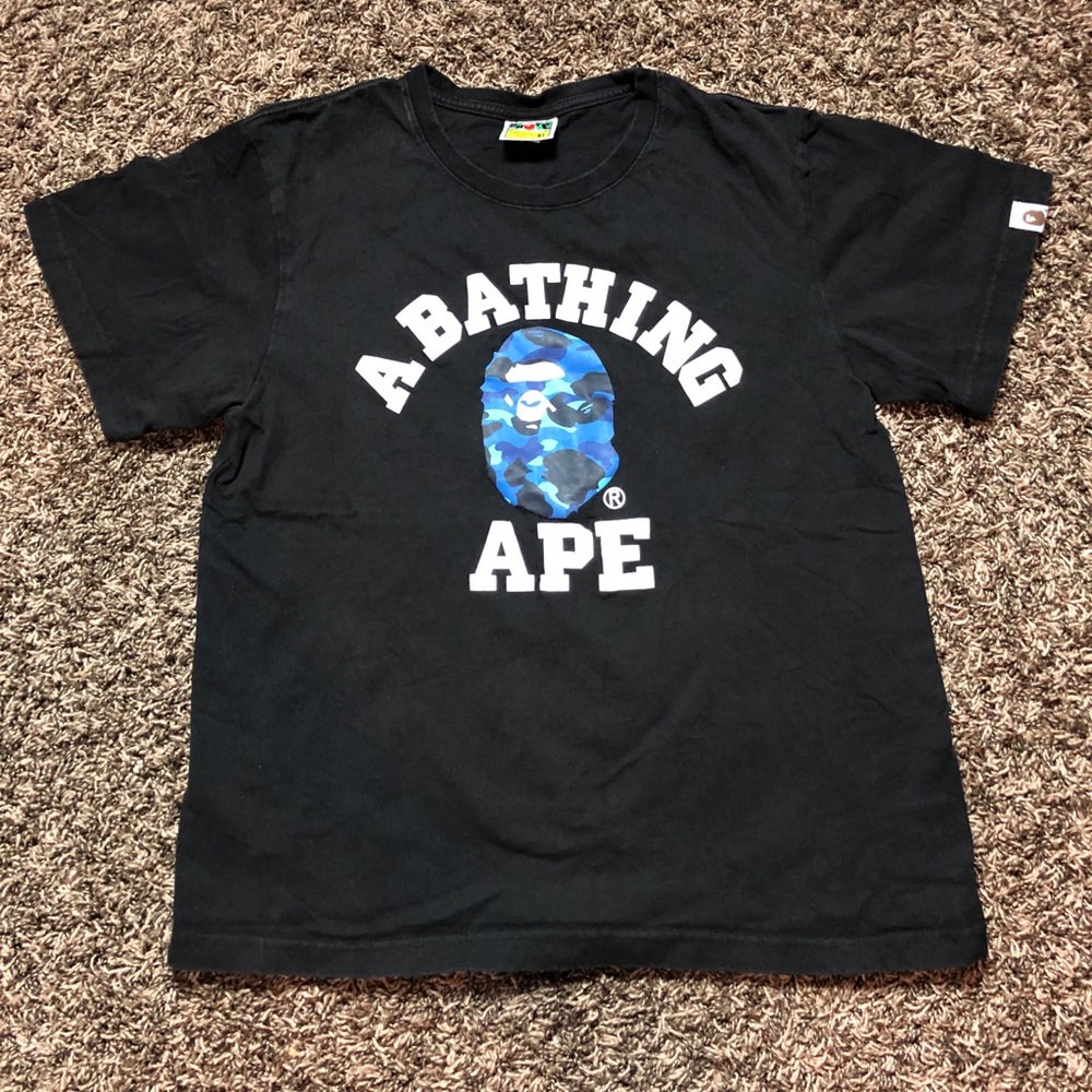 A BATHING APE: BLUE CAMO COLLEGE TEE (SIZE XL)